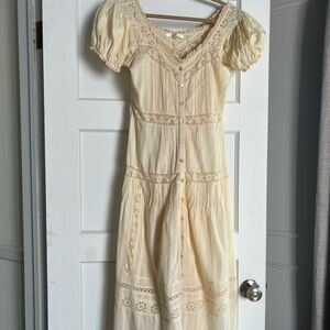 Love shack fancy lace trimmed dress in vintage white.